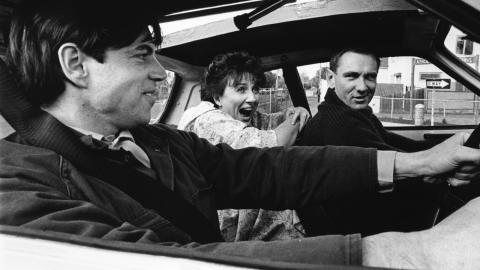 Colin Friels as Malcolm demonstrates how his getaway car splits in two.