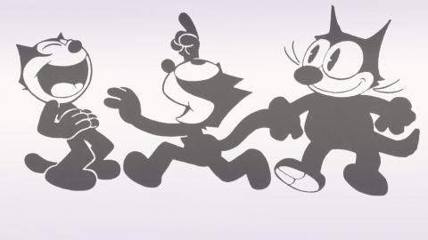 A set of three drawings of the cartoon character Felix the Cat in different poses.