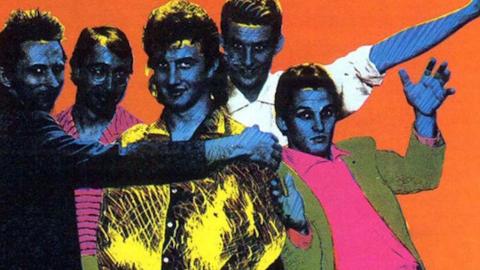 Album cover for mental As Anything's record 'Get Wet' with a hyper saturated colour photo of the band members.