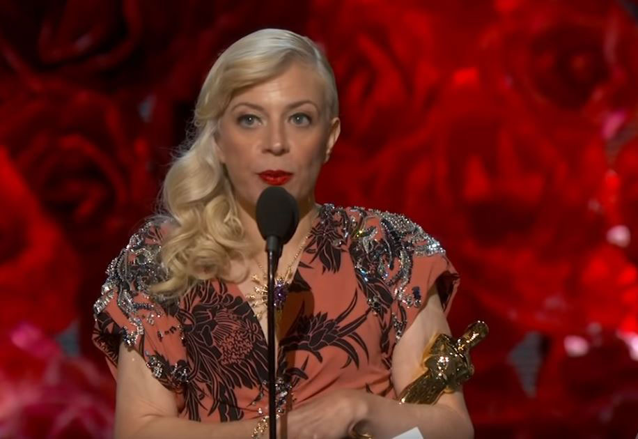 Catherine Martin accepts the Oscar for costume design at the Academy Awards.